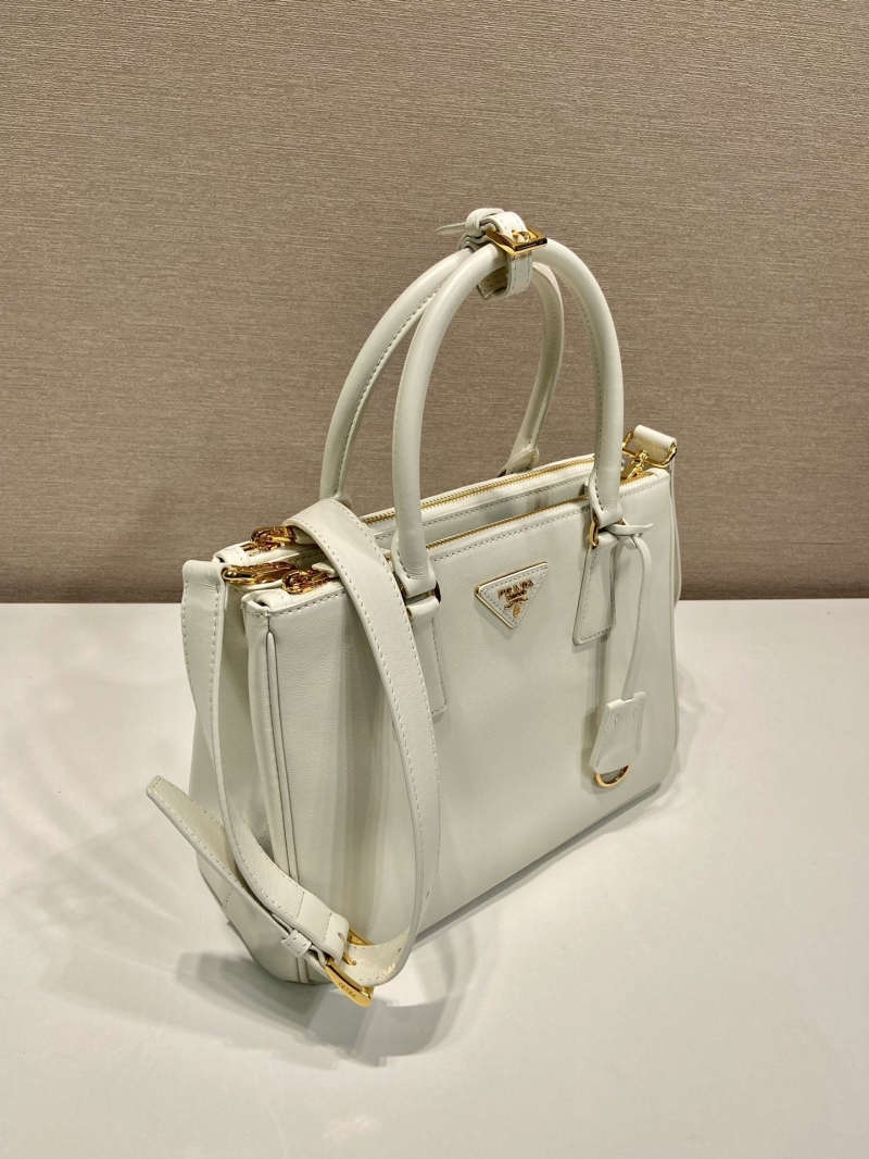 Pra*a top handle bags